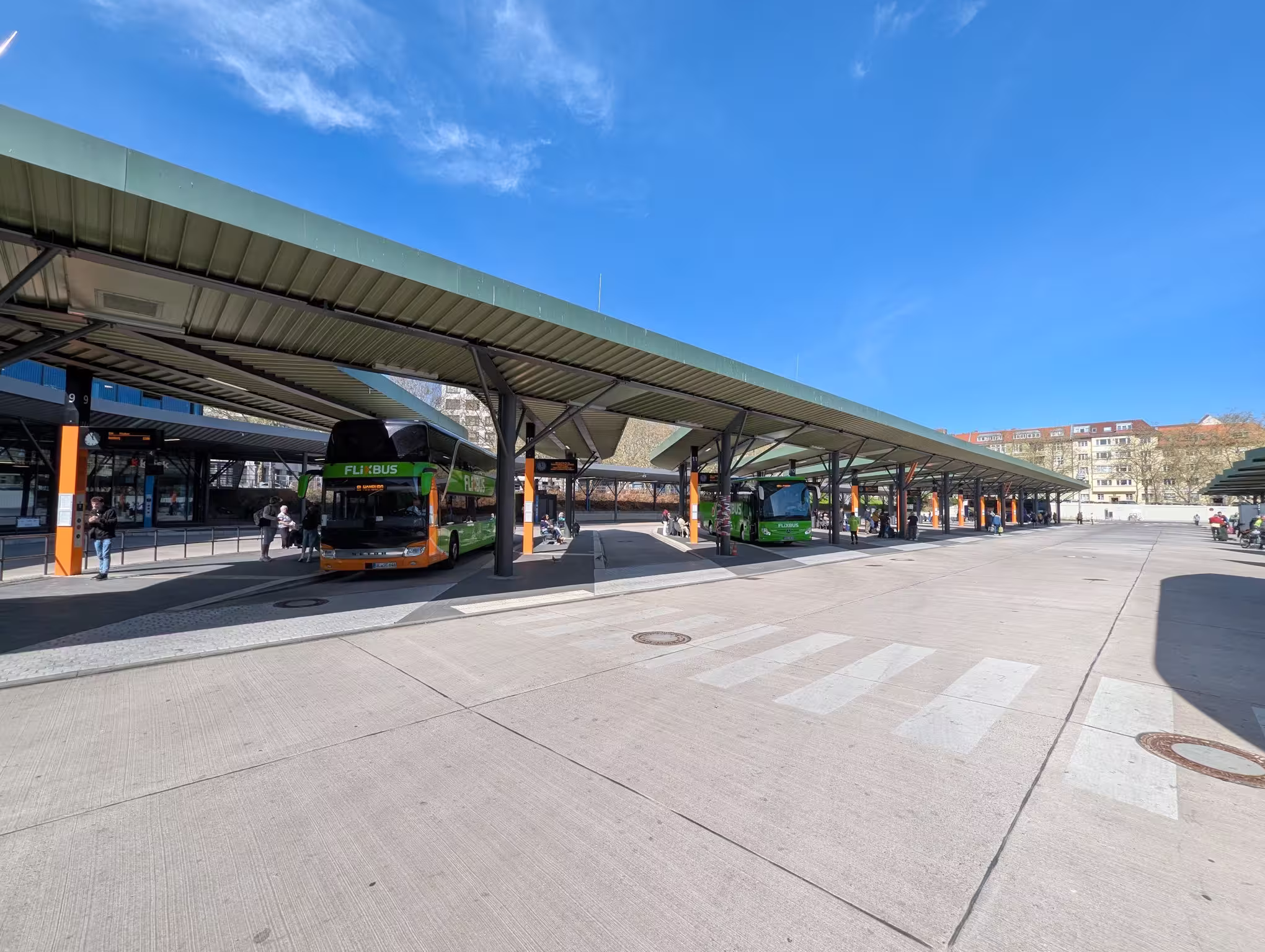 The ZOB bus stops from the front with parked coaches